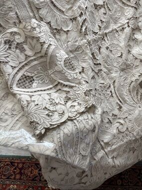 Handmade tablecloth and two napkins—new.